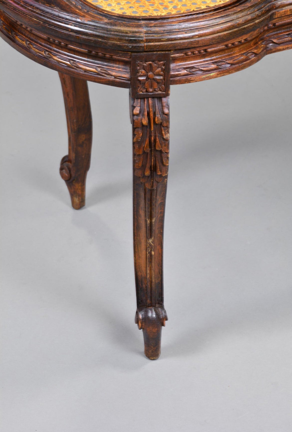 Carved Bench with woven seat